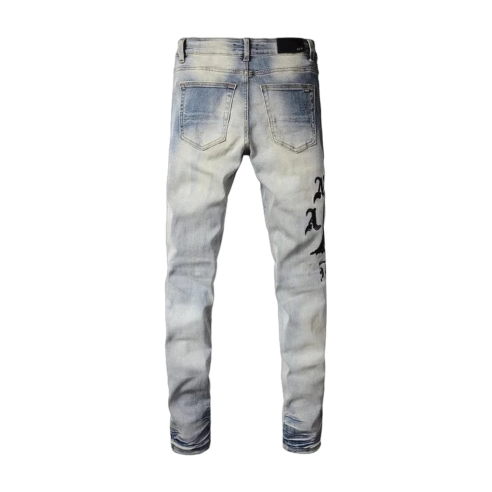 Amiri Distressed Skinny Jeans