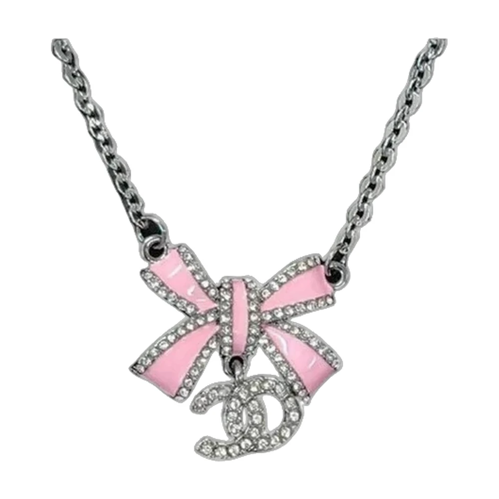 Chanel Cc Bow Earrings